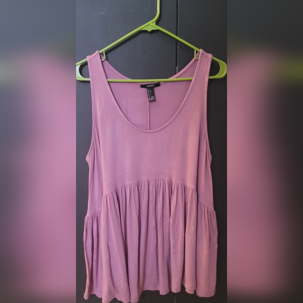 Baby doll mauve sleevless top.